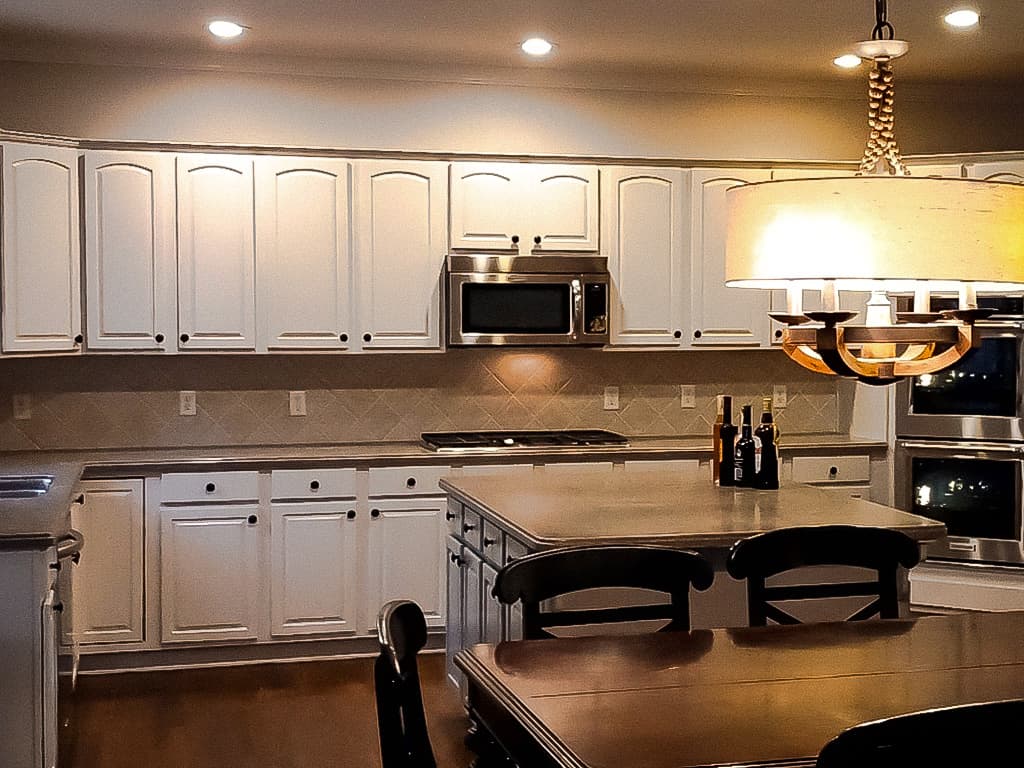 Light refinished kitchen cabinets after ProFound Painting work