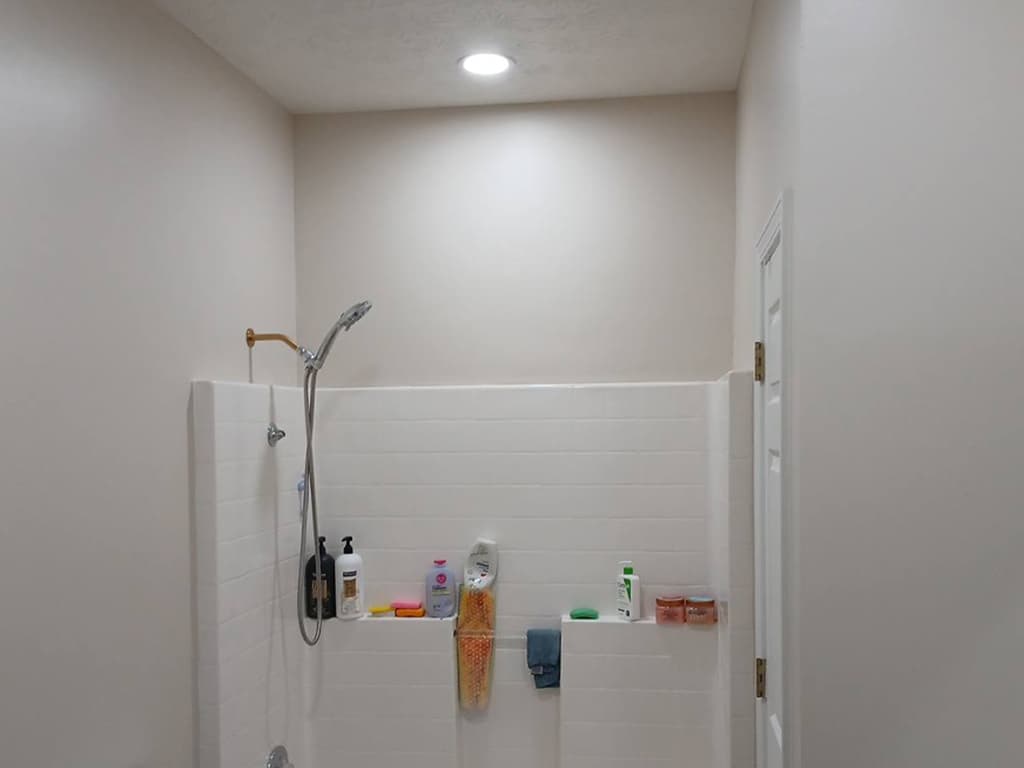 Bathroom wall after repair and fresh paint