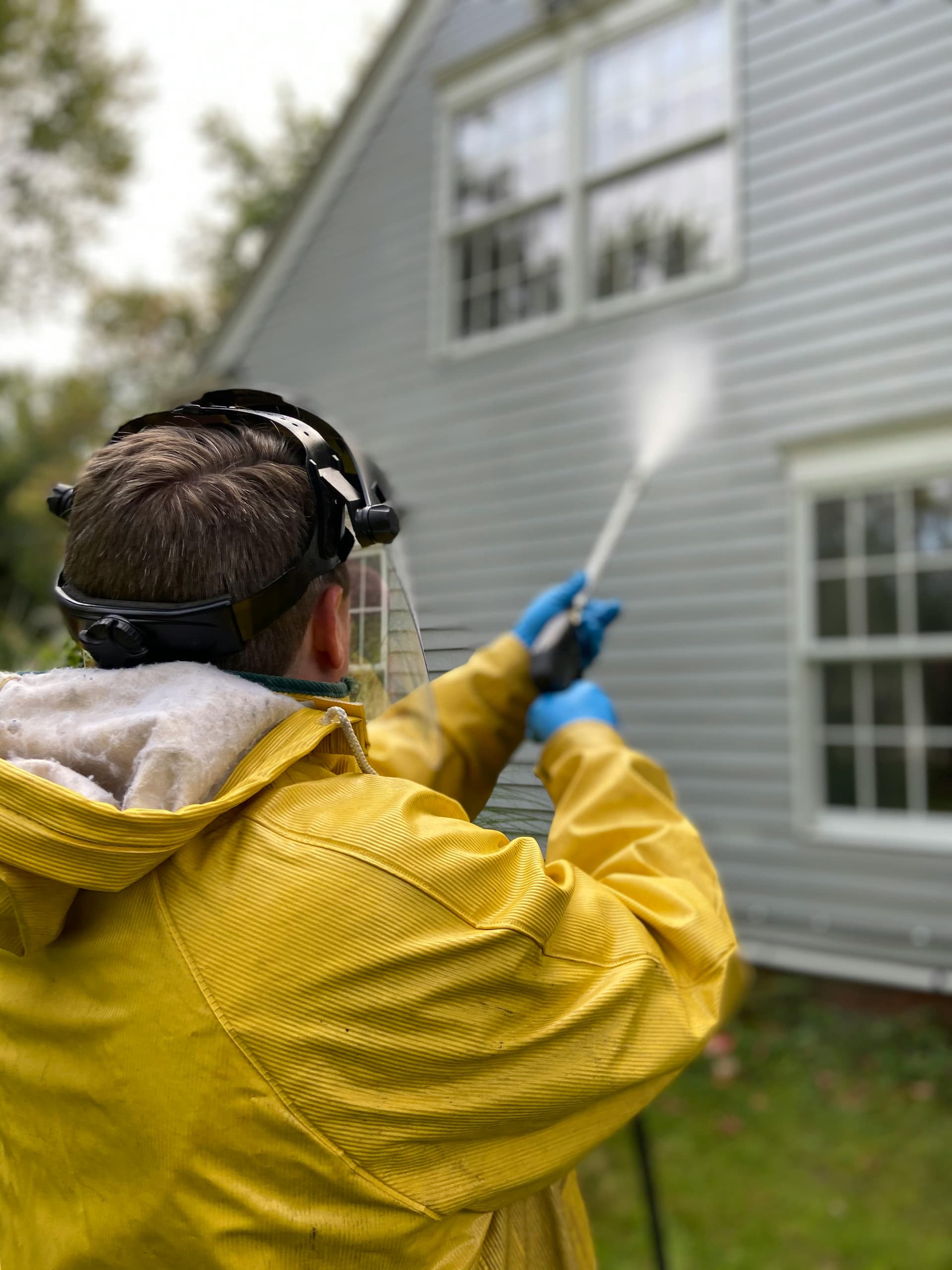 Pressure washing exterior surfaces for a North Georgia home by ProFound Painting LLC
